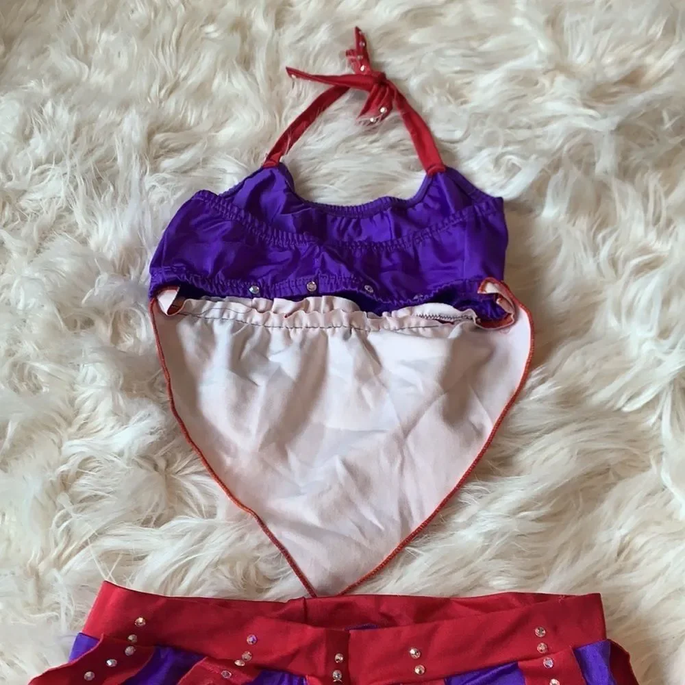 Custom dance costume with Swarovski crystals. Orange, Red and Purple Two Piece
